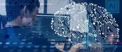 2 étudiants devant un ordinateur en train d'apprendre à développer une intelligence artificielle